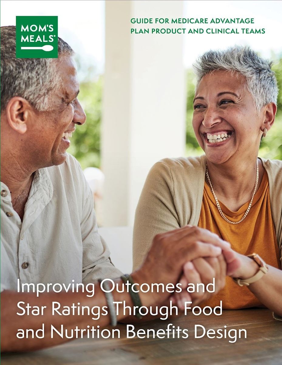 Medicare Advantage white paper cover with man and woman holding hands at a table outside