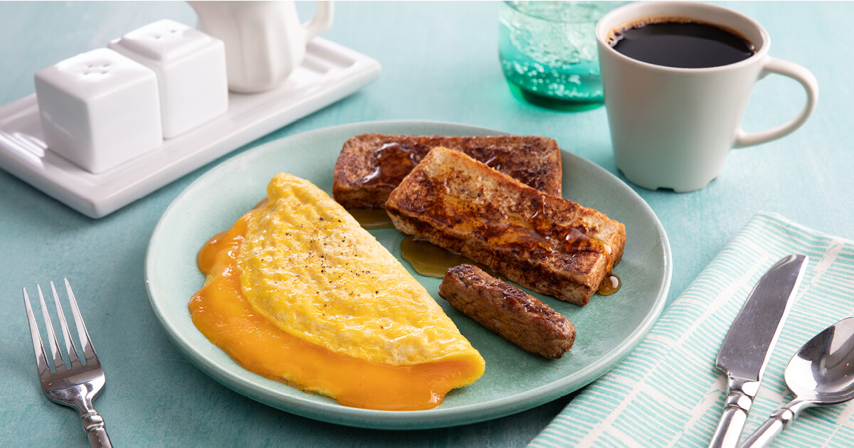 Colby Cheese Omelet, French Toast Sticks and Turkey Sausage Link